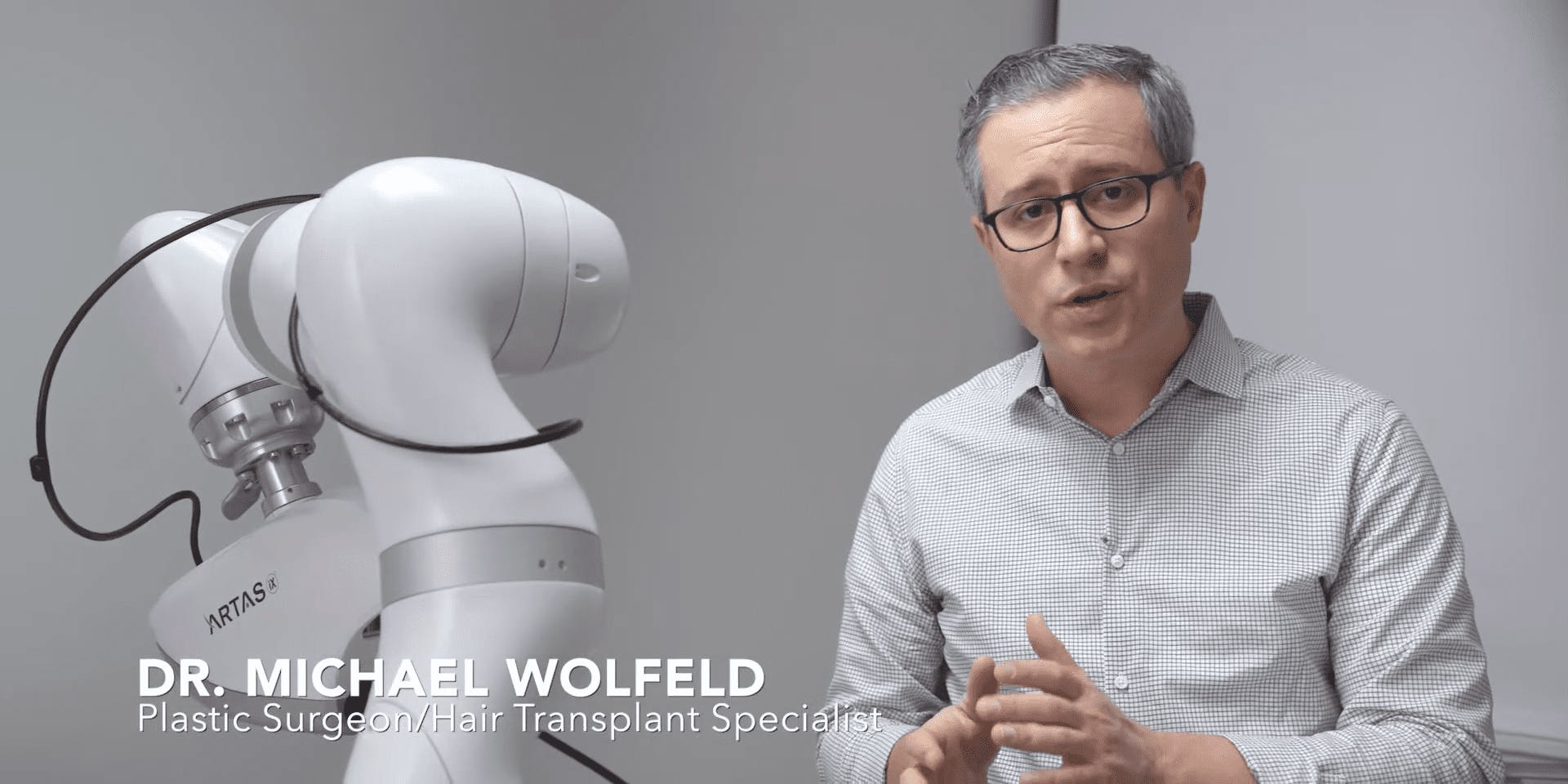 Dr. Wolfeld discussing the ARTAS system