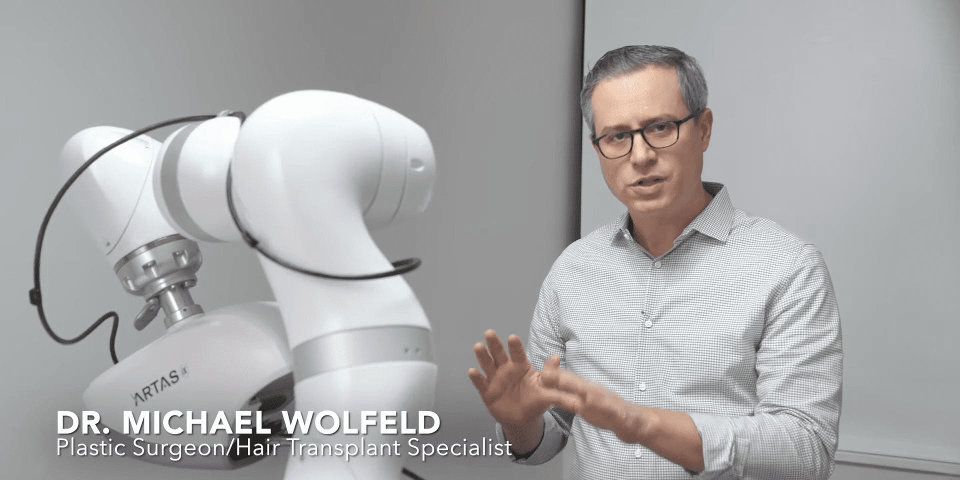 Dr. Wolfeld discussing the ARTAS system