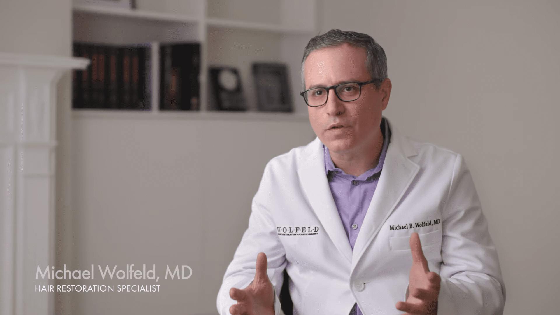 Dr. Wolfeld discussing hair restoration