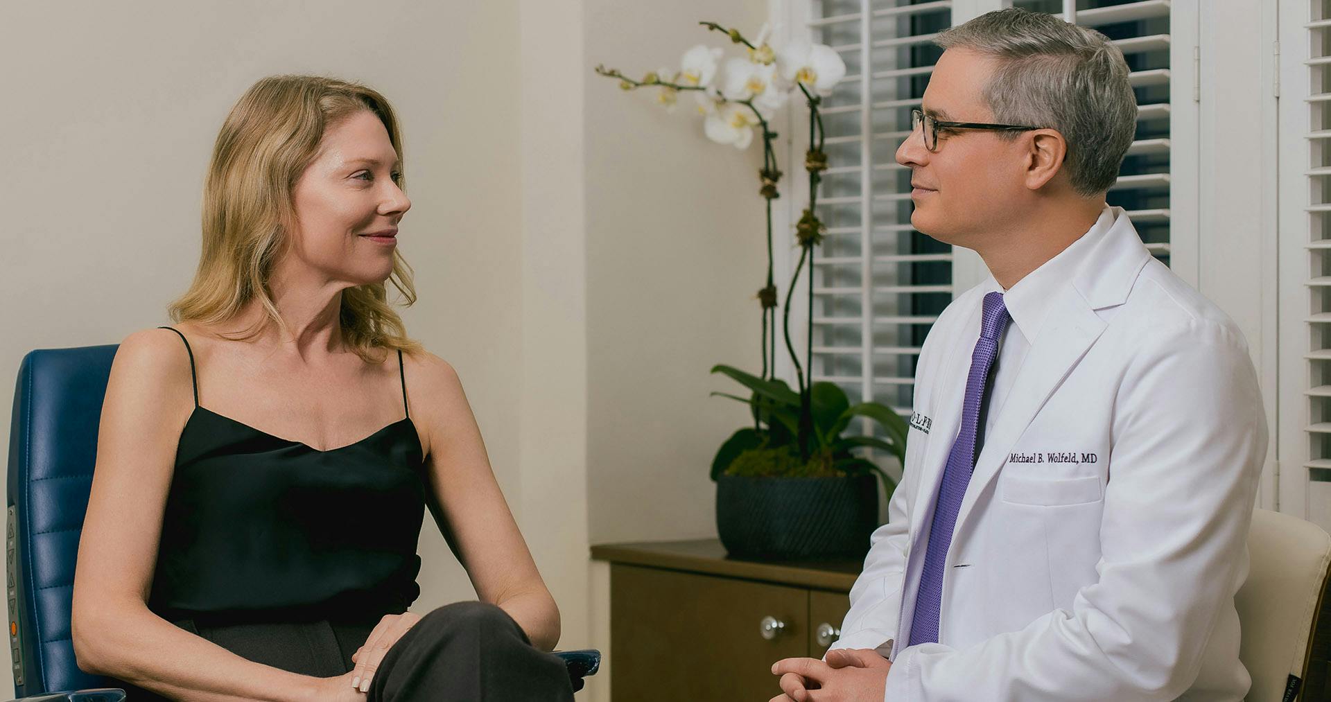 Dr. Wolfeld and patient during consultation