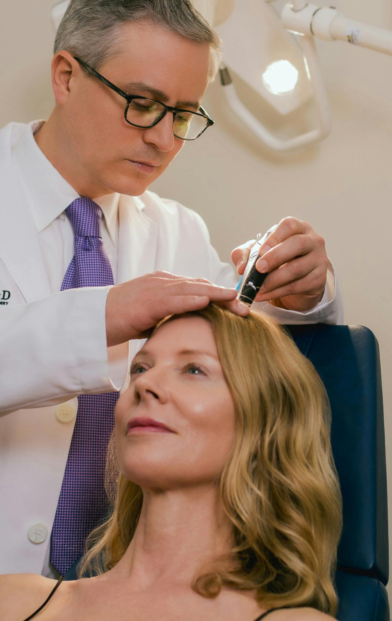 Dr. Wolfeld and patient during treatment
