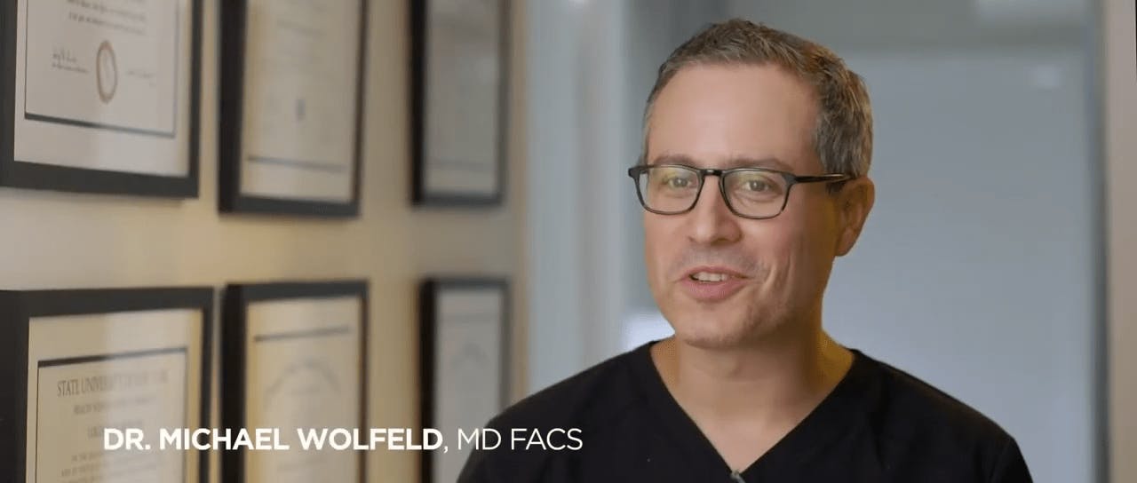 Dr. Wolfeld smiling