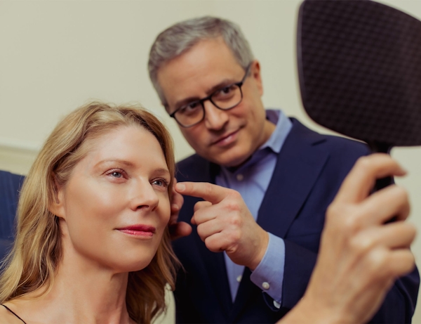 Dr. Wolfeld and patient during treatment