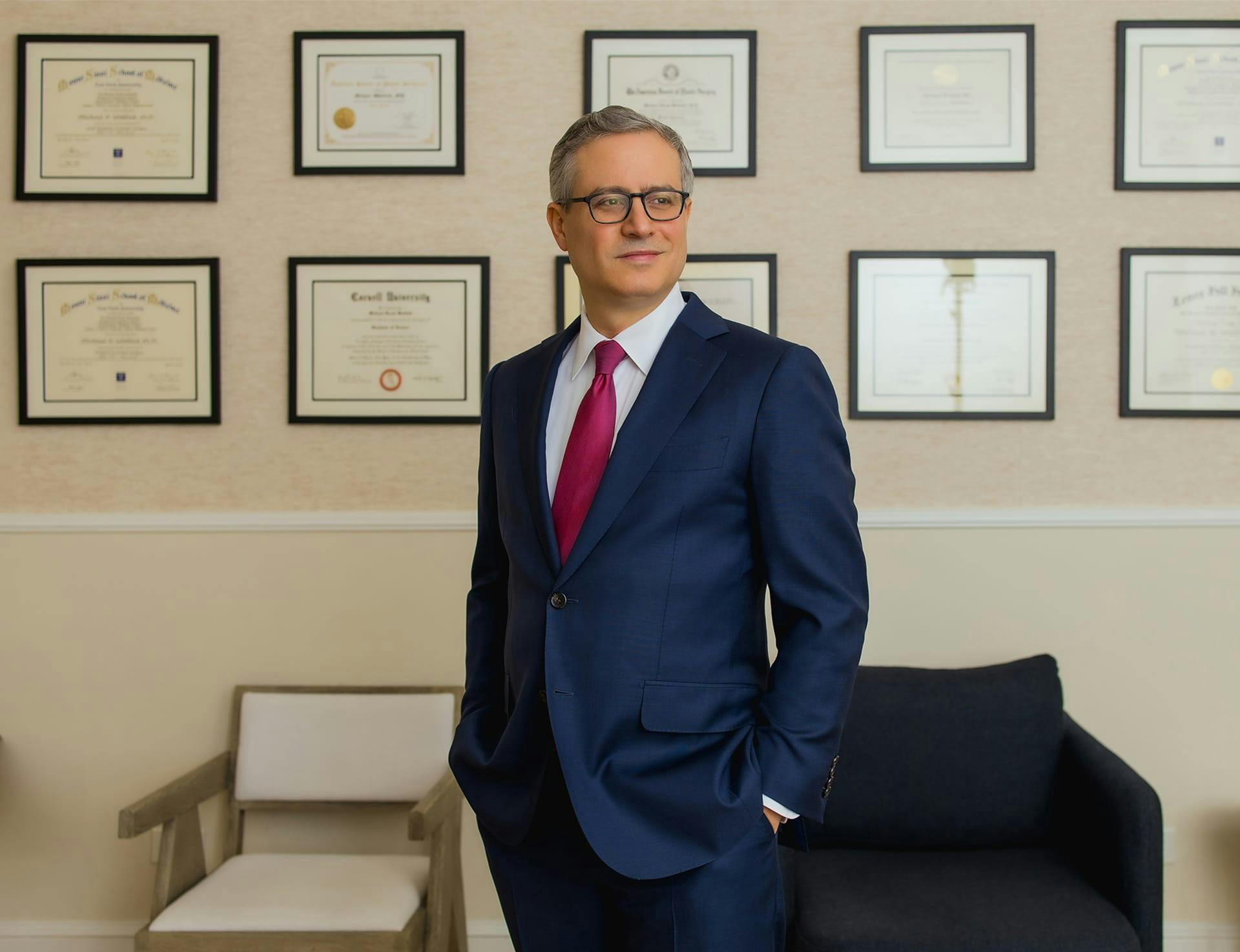 Dr. Wolfeld in front of accomplishments