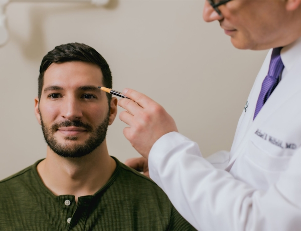 Dr. Wolfeld and patient during consultation