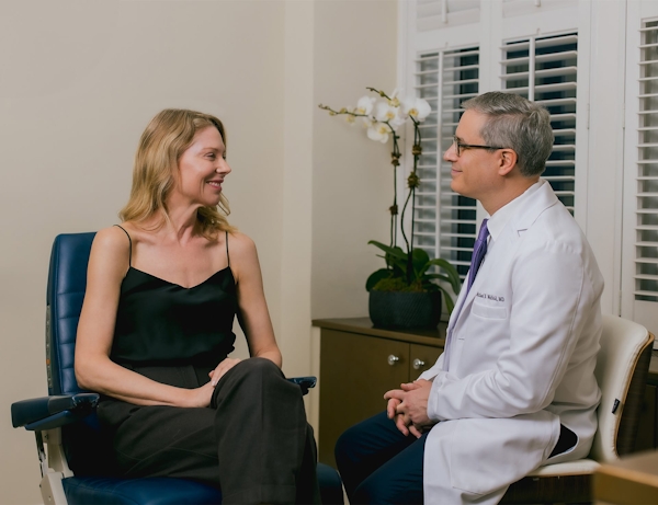 Dr. Wolfeld and patient during consultation