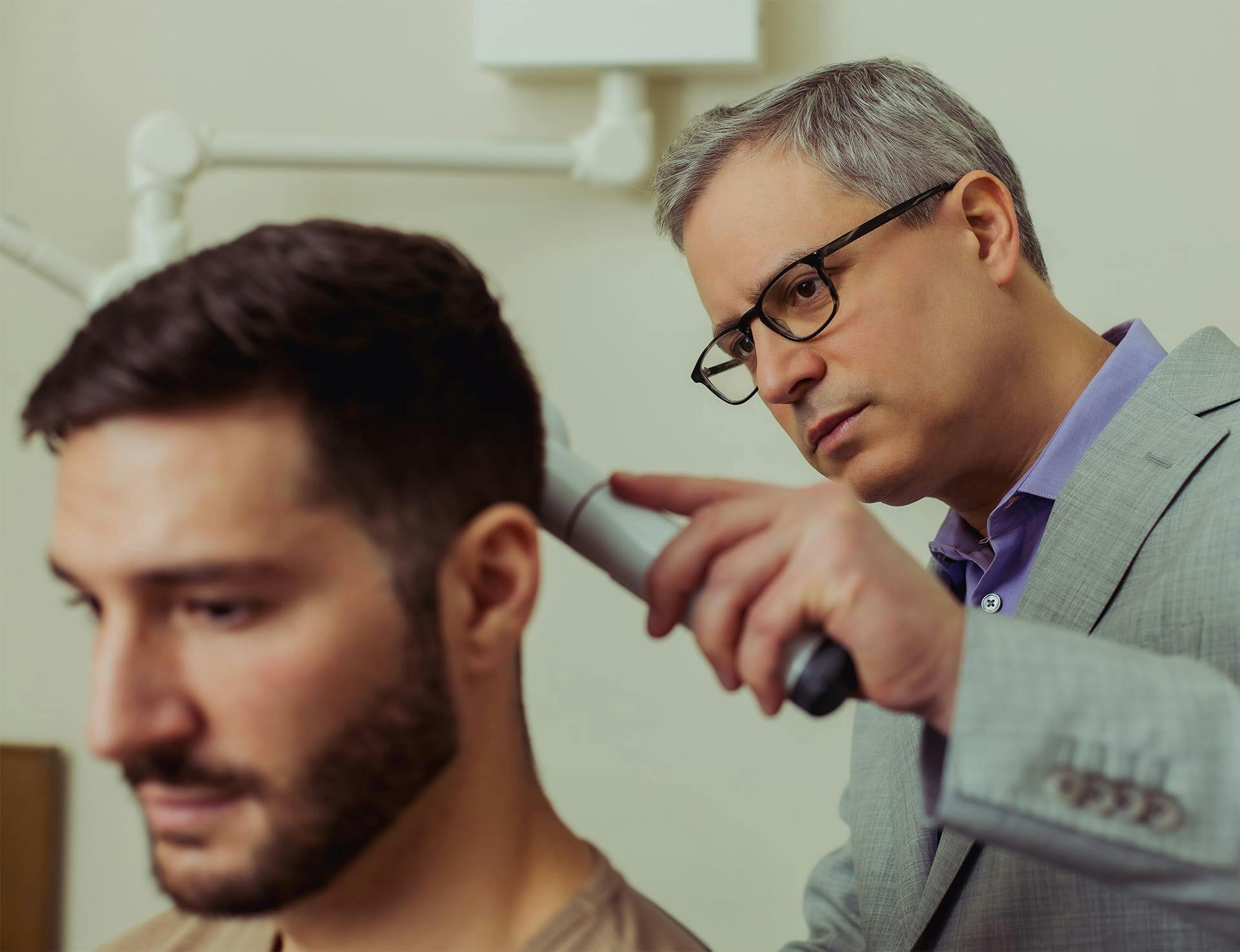 Dr. Wolfeld and patient during treatment