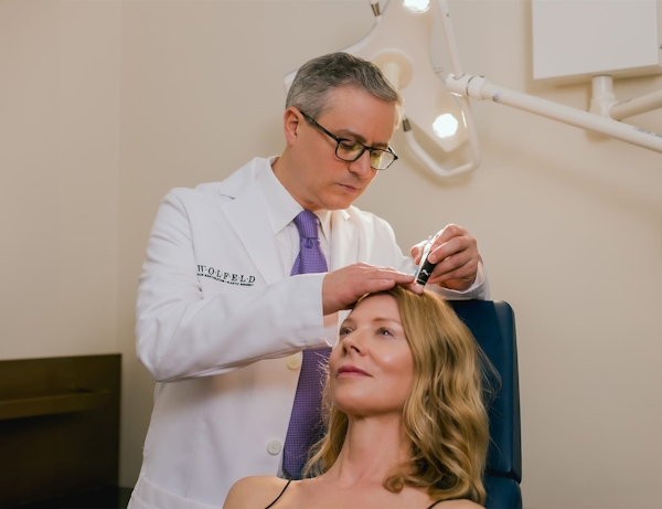 Dr. Wolfeld and patient during treatment