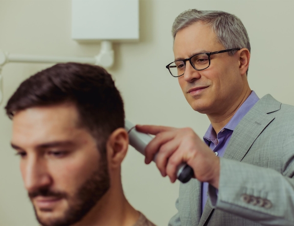 Dr. Wolfeld and patient during treatment
