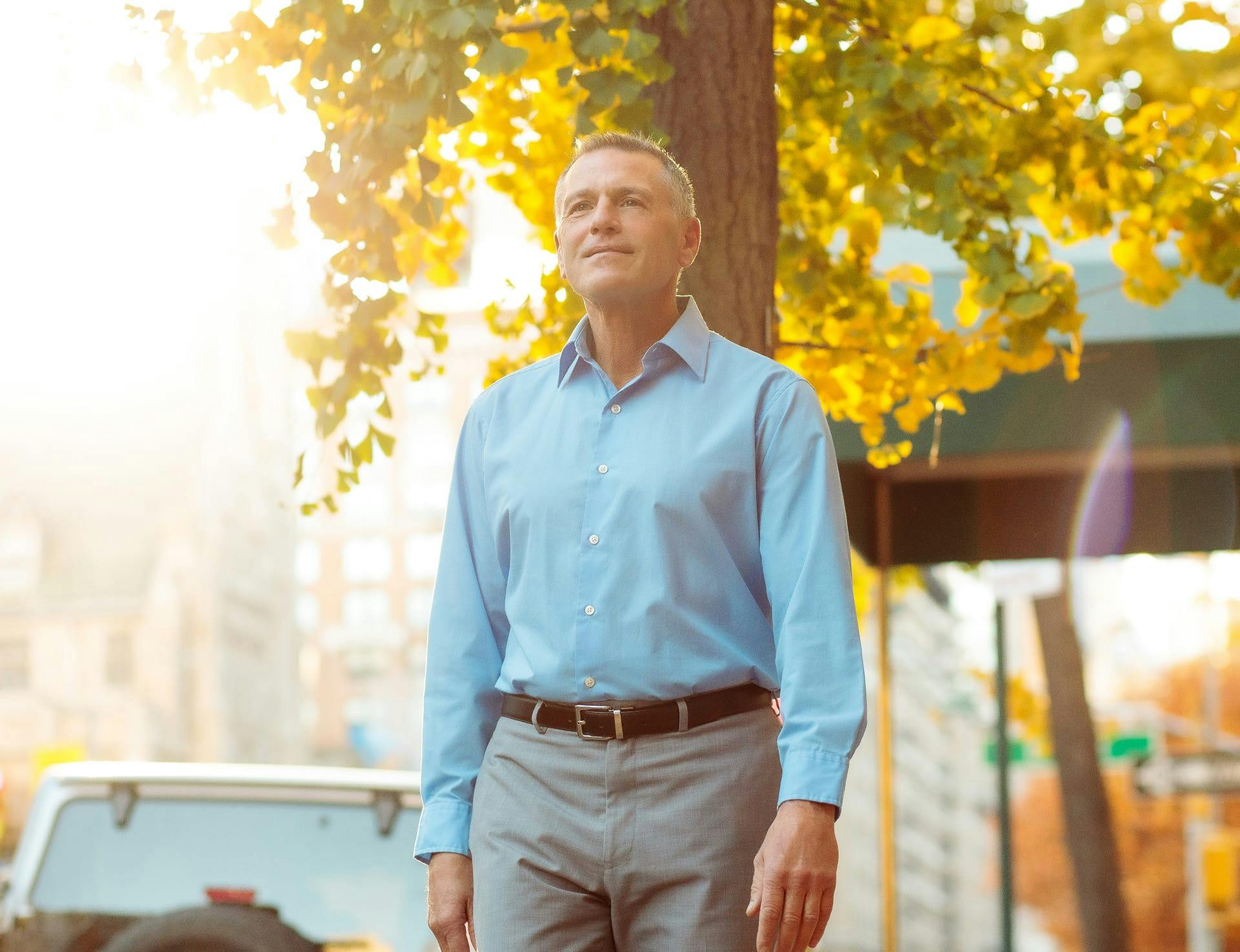man outside smiling