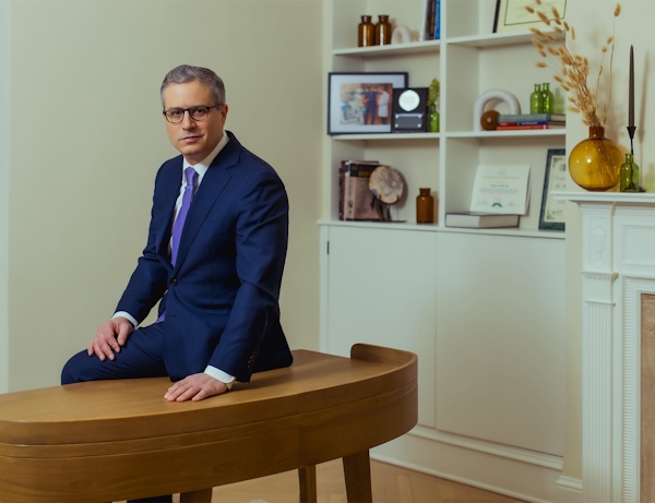 Dr. Wolfeld sitting on a table