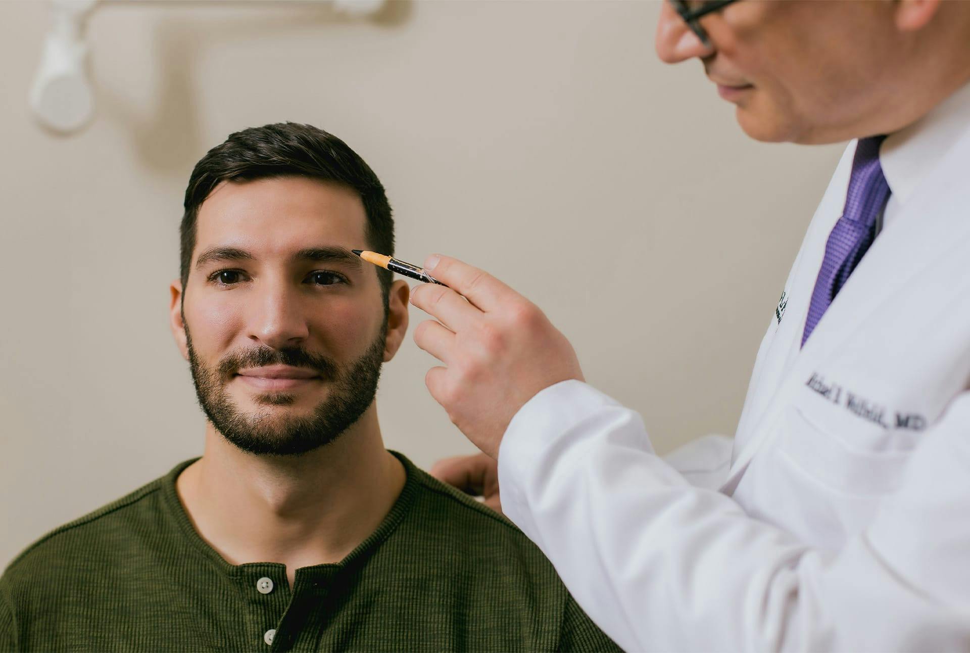 Dr. Wolfeld and patient during treatment