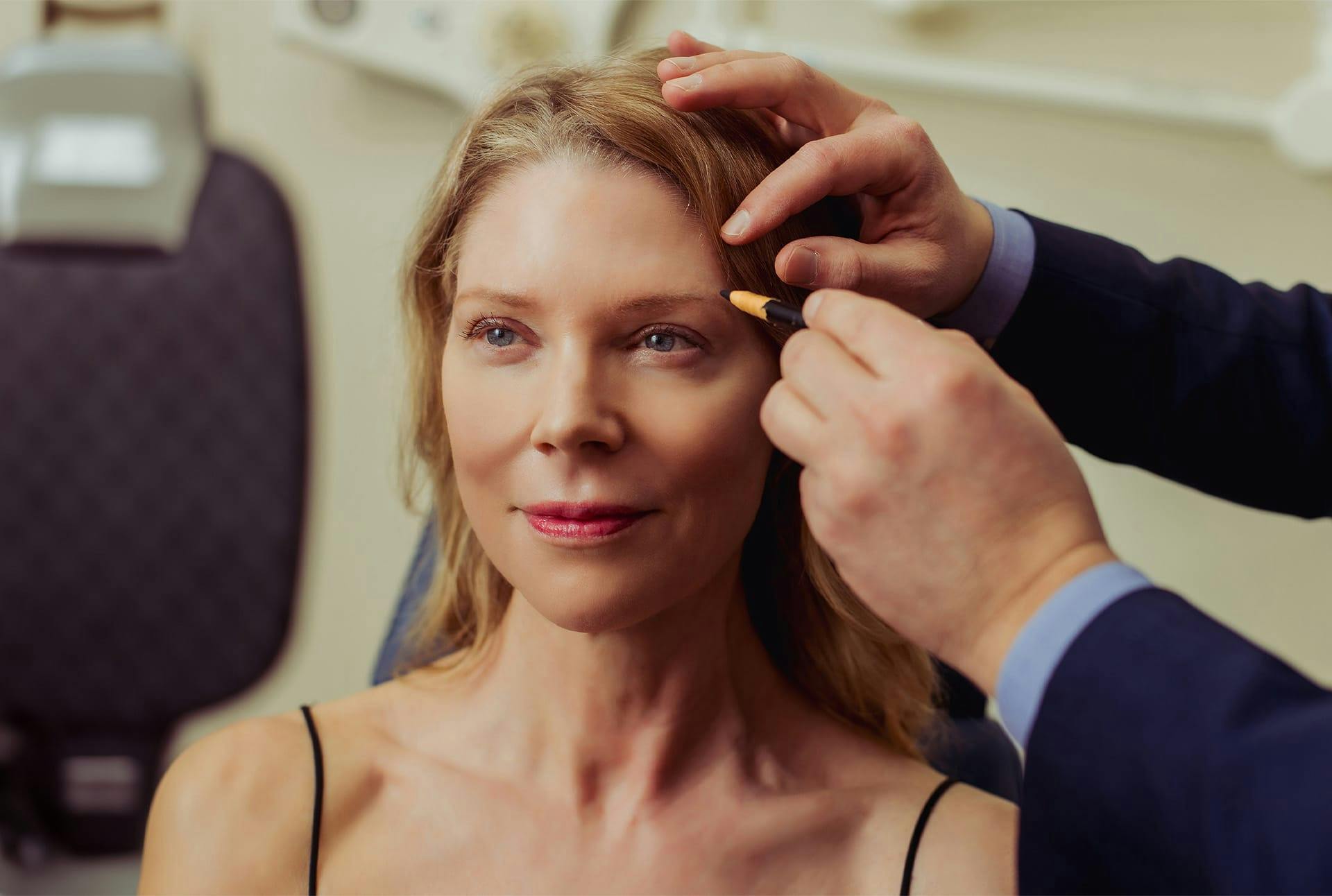 Dr. Wolfeld and patient during treatment