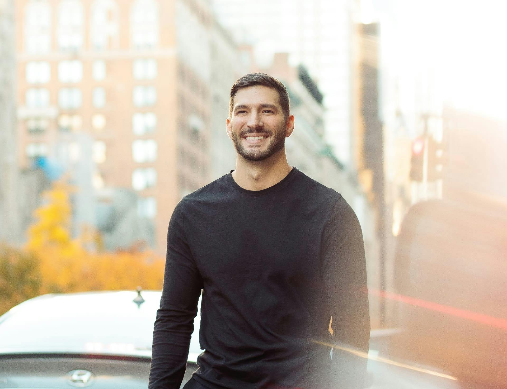 man outside smiling