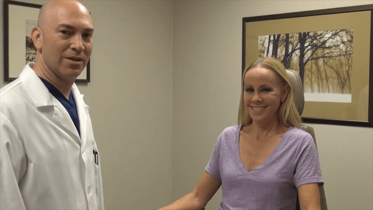 doctor and patient smiling