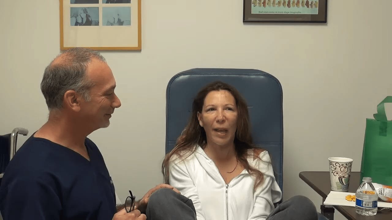 doctor talking to patient