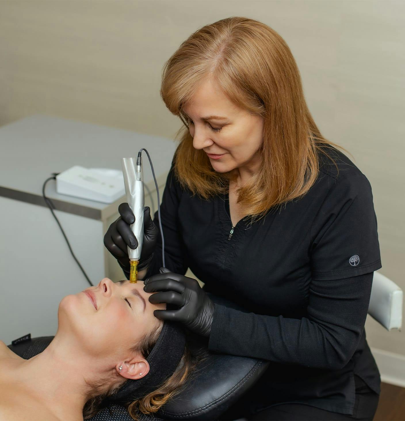 woman receiving dermapen