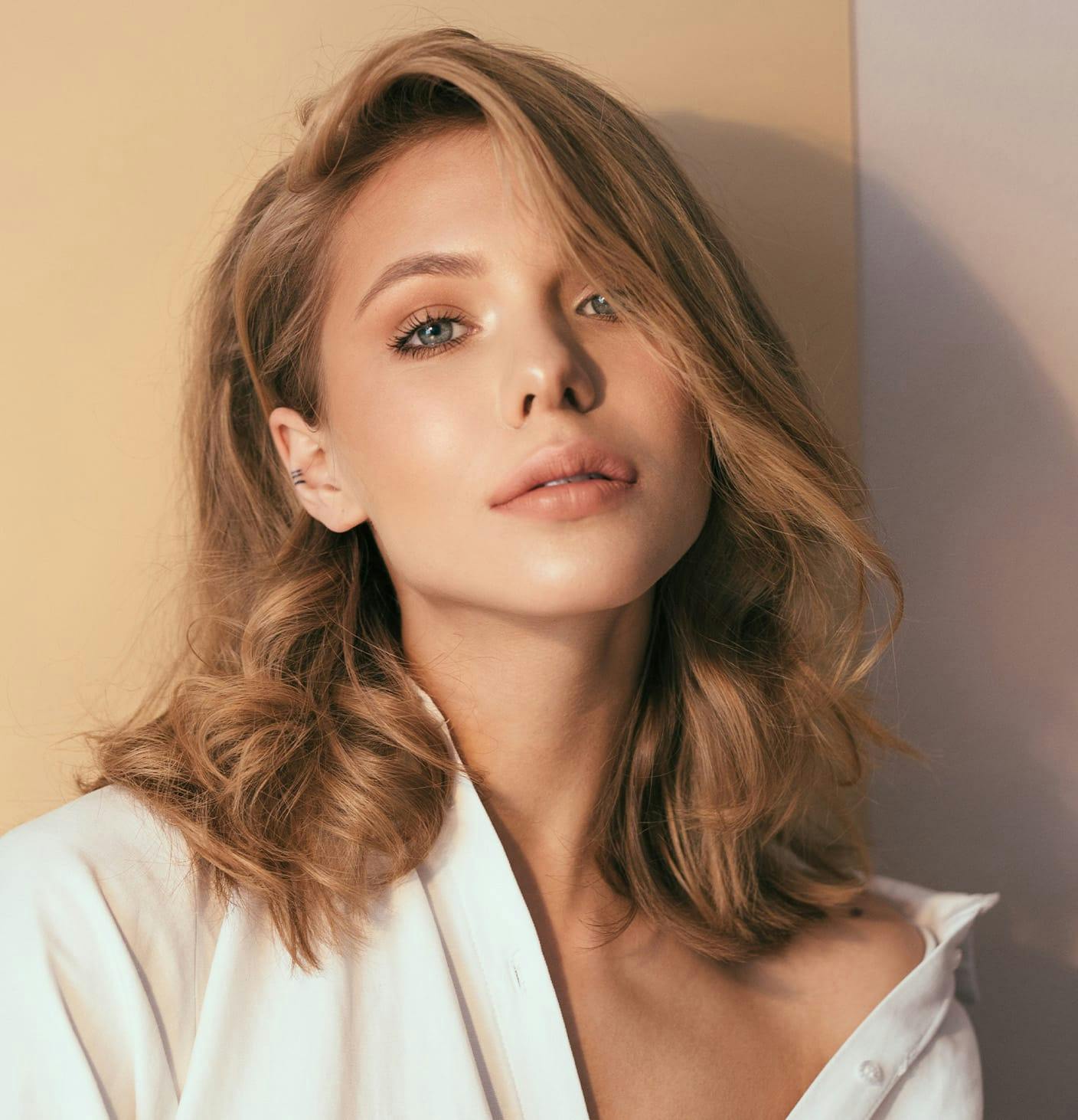 woman whos shirt is off the shoulder