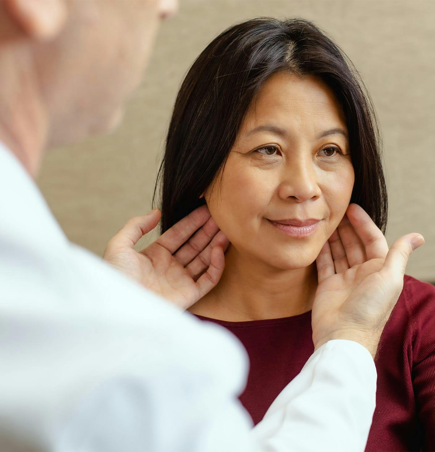 doctor touching patient's face