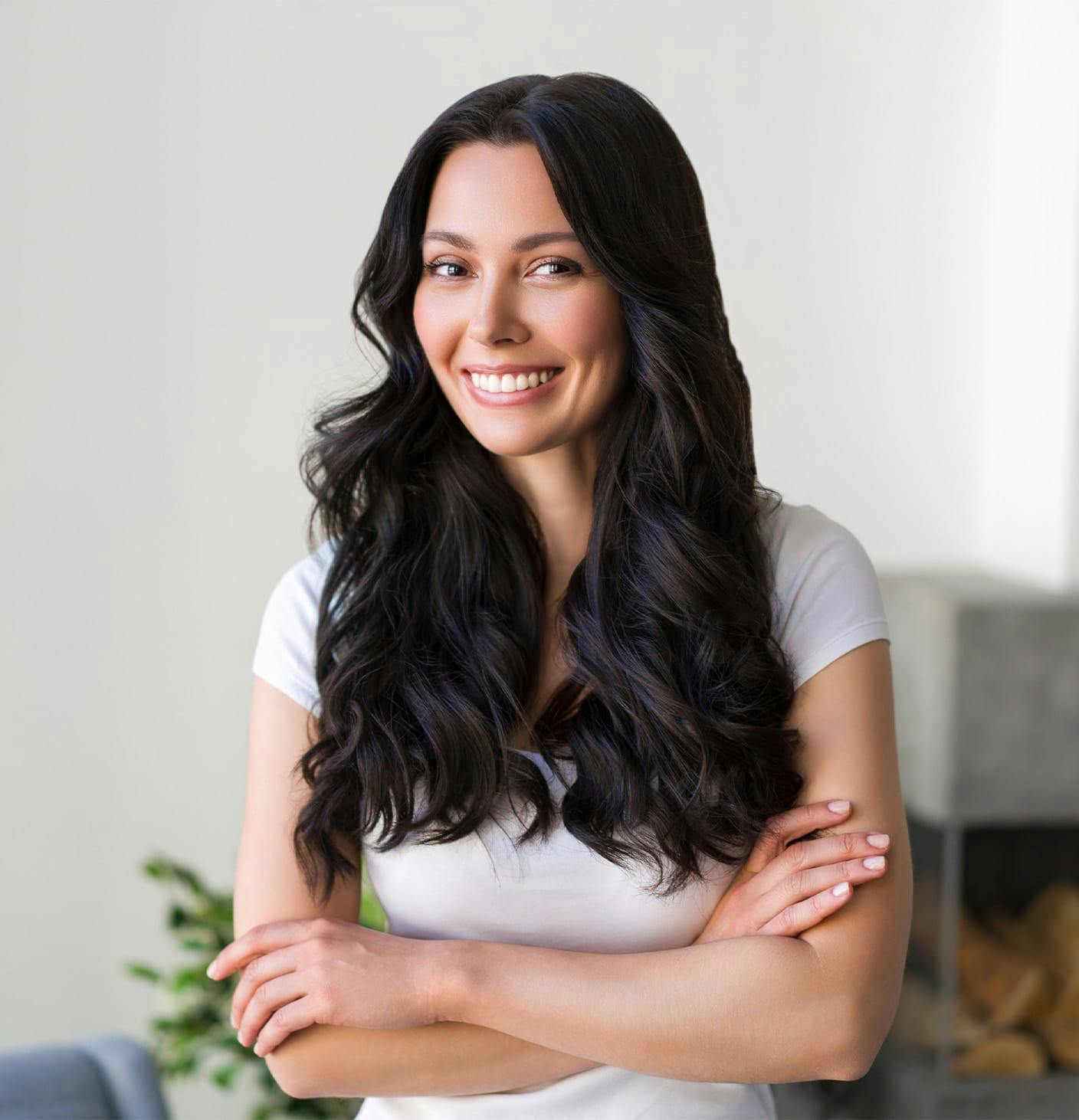 woman smiling, crossing her arms