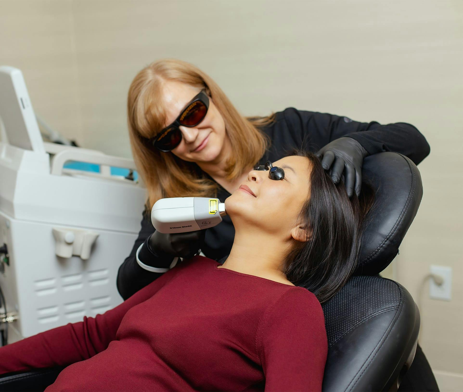 woman receiving laser hair removal
