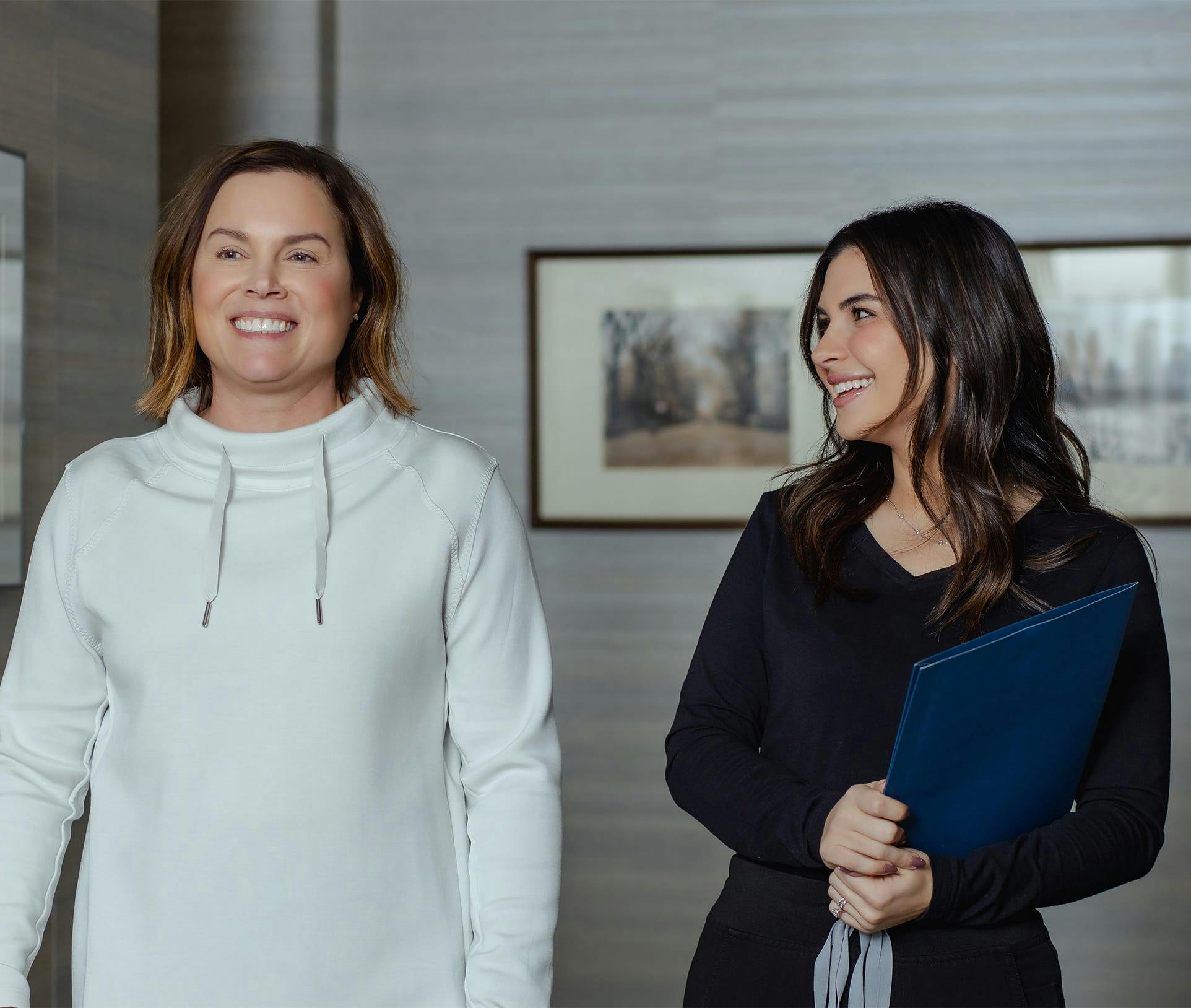 two women smiling