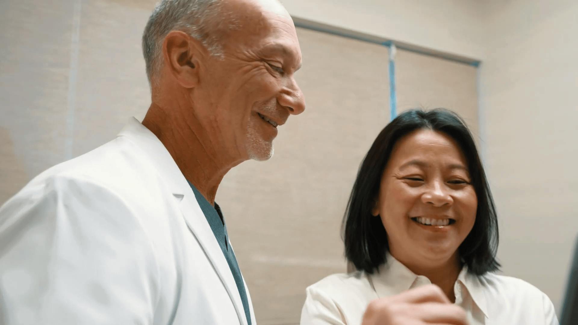 doctor and patient smiling