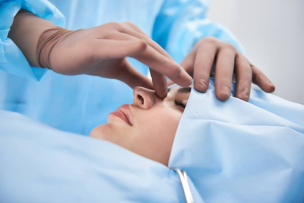 woman about to have nose surgery