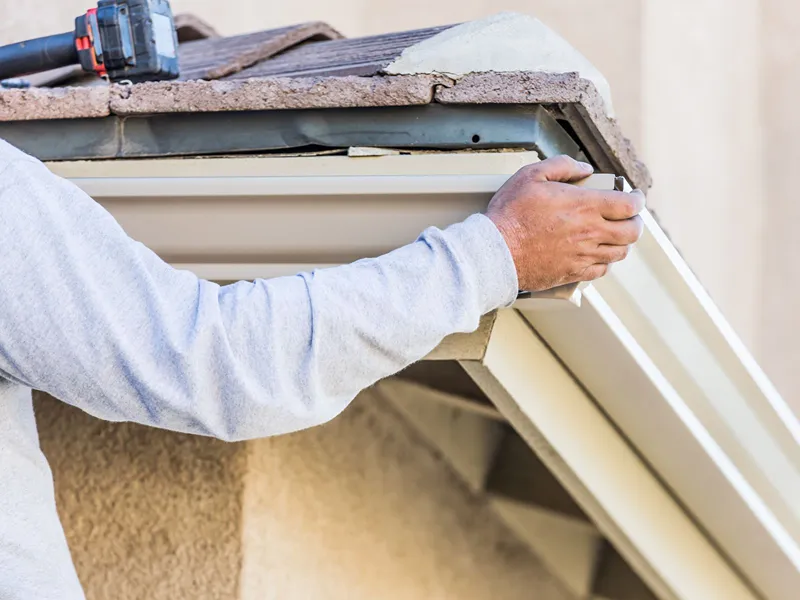 worker installing gutter