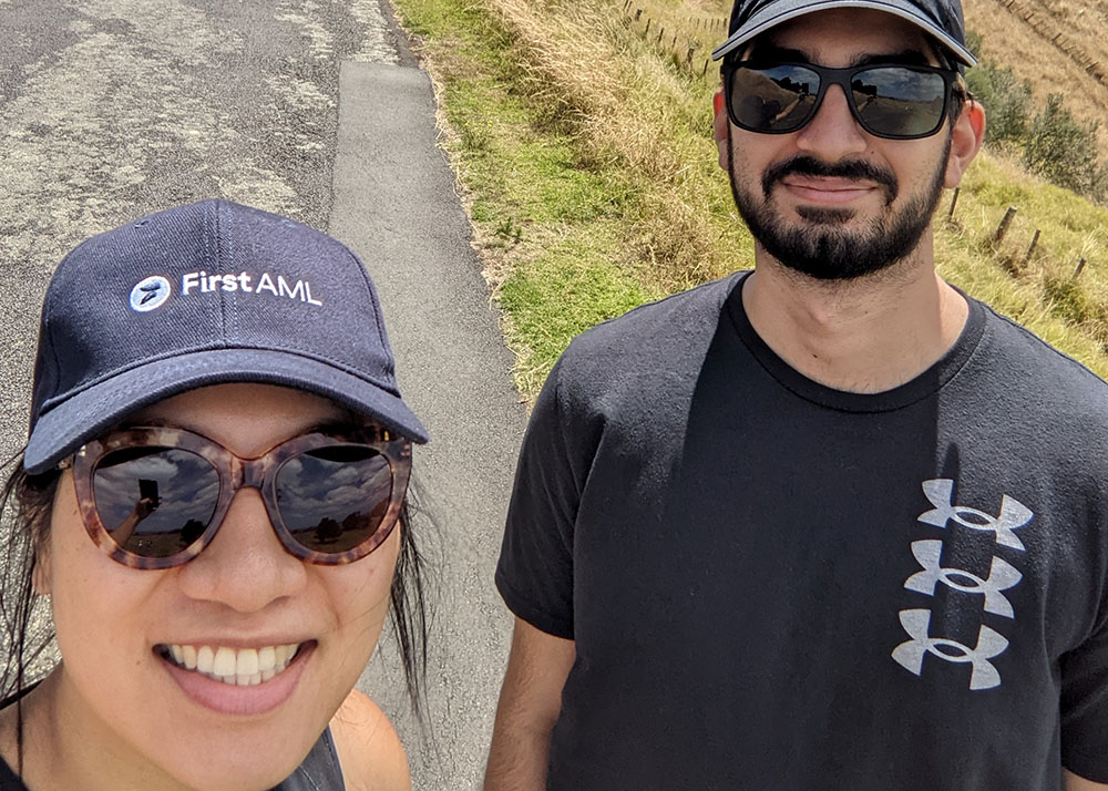 Lucy and Farmehr taking a selfie together outside