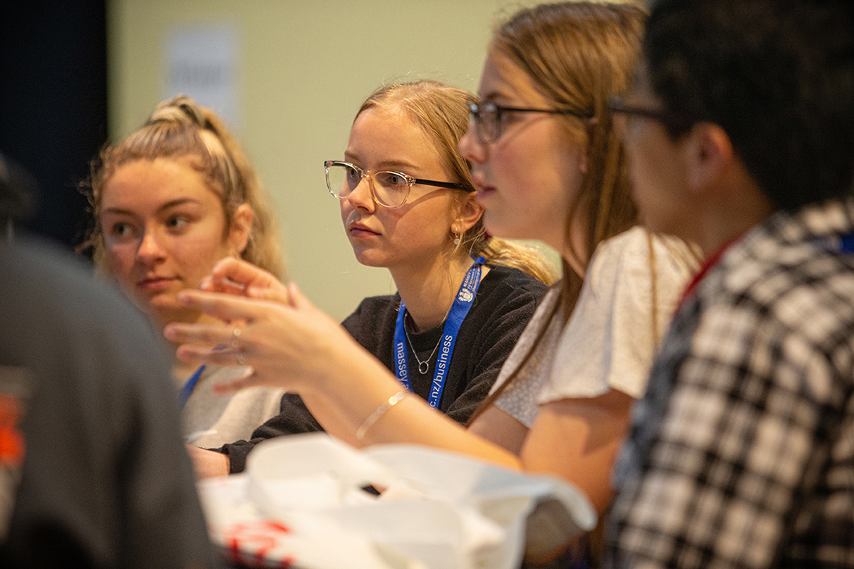 A team member talking to the group