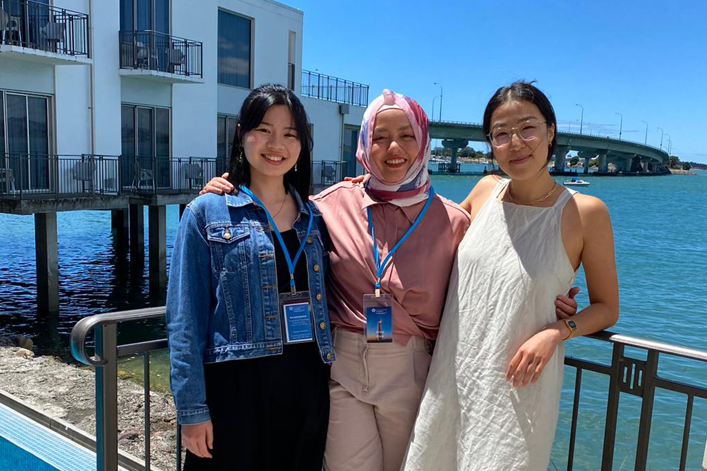 Arina,  and Magdeline and Dayeon by water at the Leadership Network Rethinking Leadership Hui in Tauranga