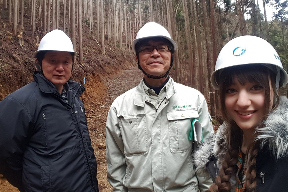 Jade with two co-workers in Japan