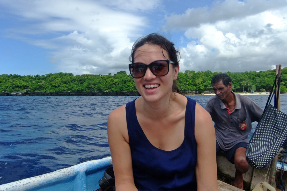 Dana in a boat on the water