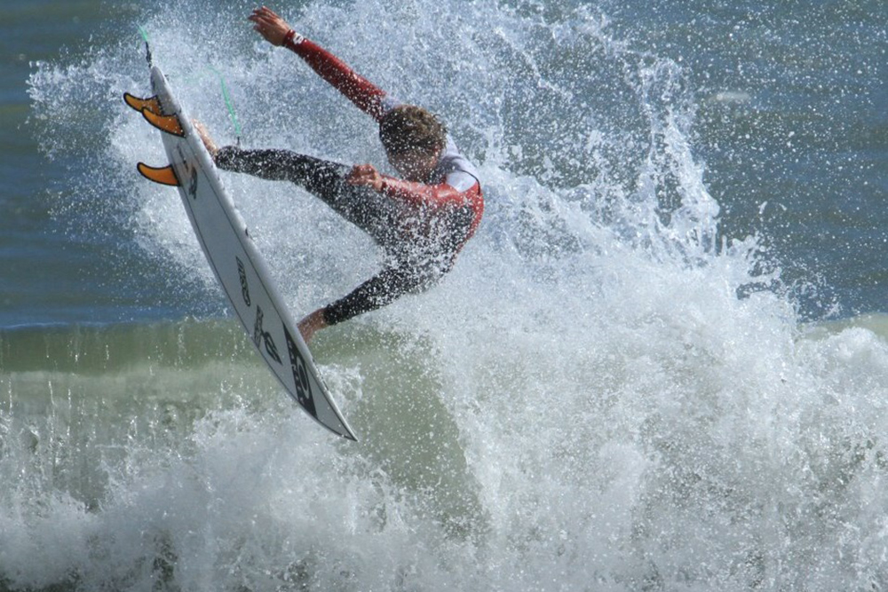 Billy Stairmand surfs on a big wave