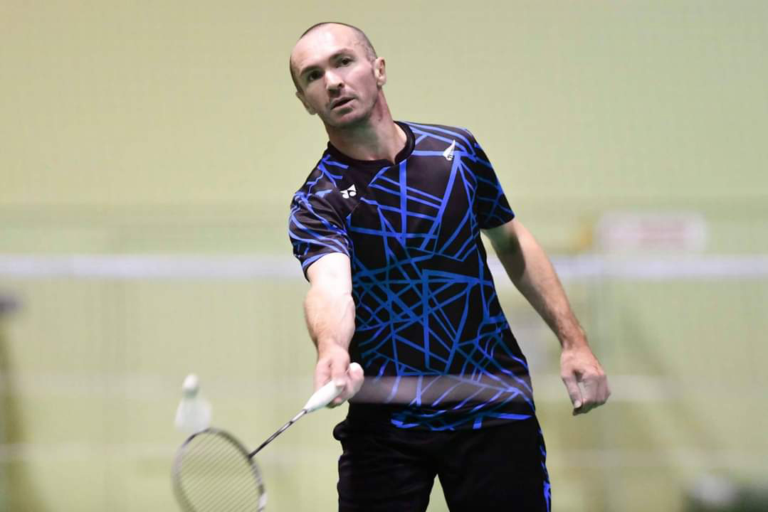 Corrie hitting a shuttlecock