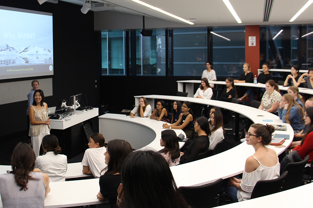 Dayeon speaking in front of an audience at the Women in Health Network