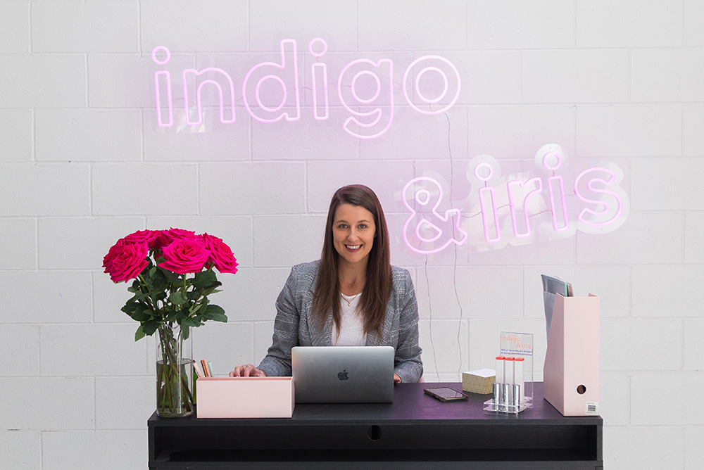 Hannah at her desk