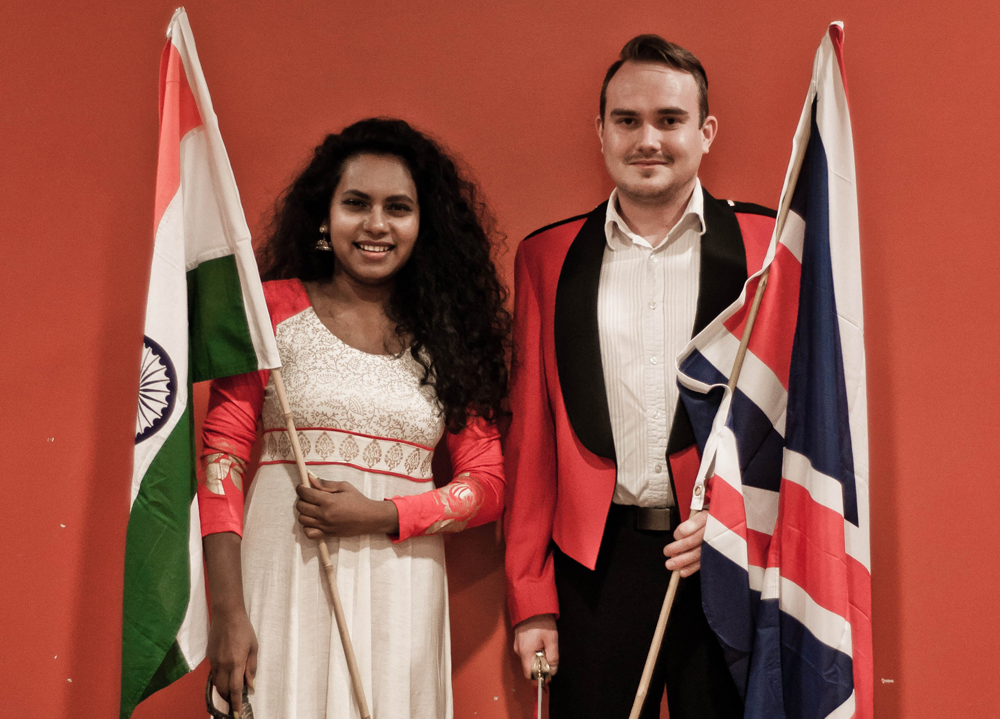 Simon and a friend holding flags