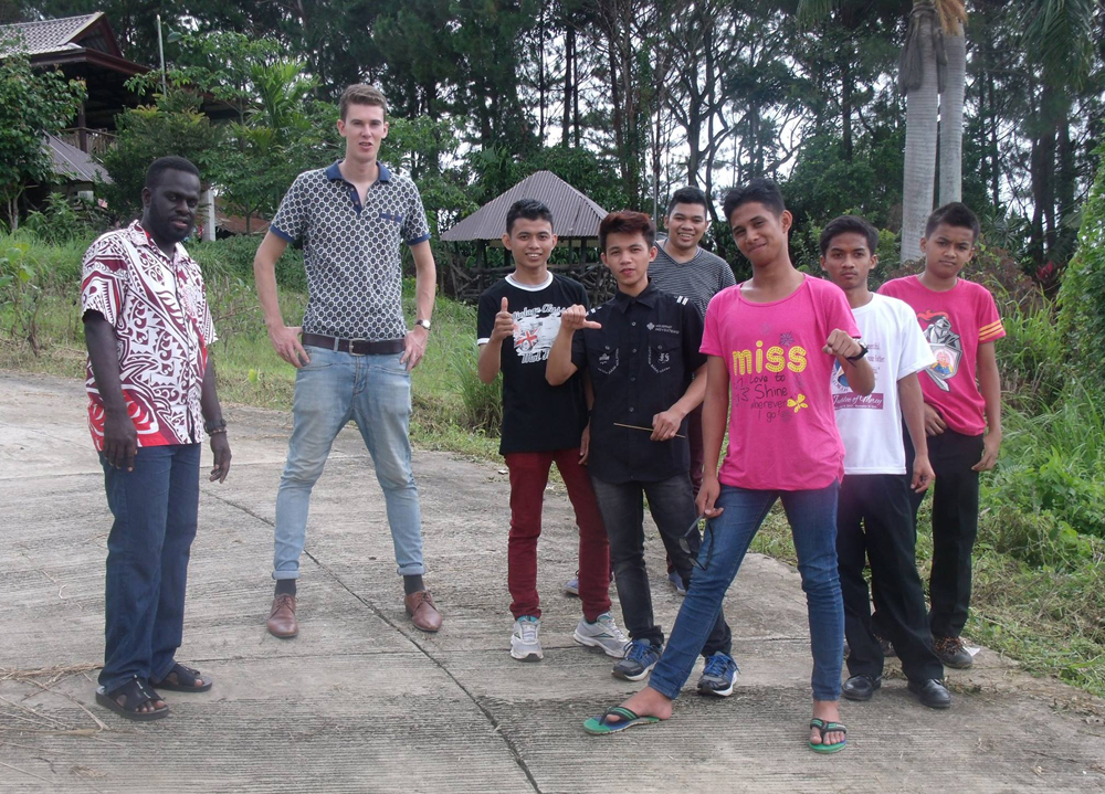 Paul winter and a group of young people