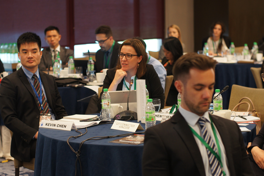 Track II delegates sitting at tables