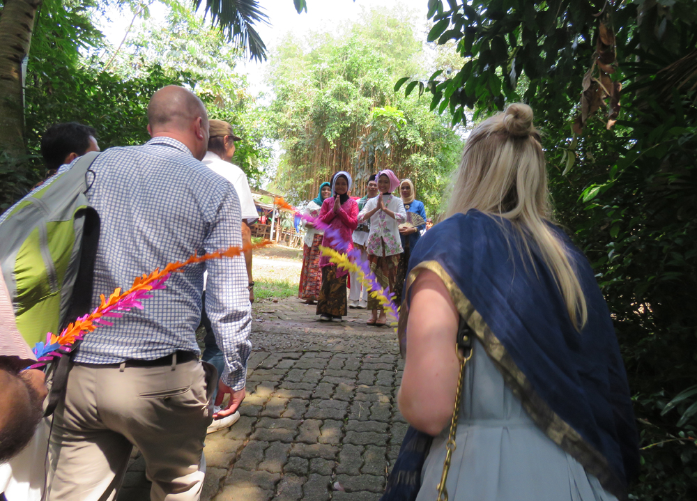 Teachers walking down cobbled path