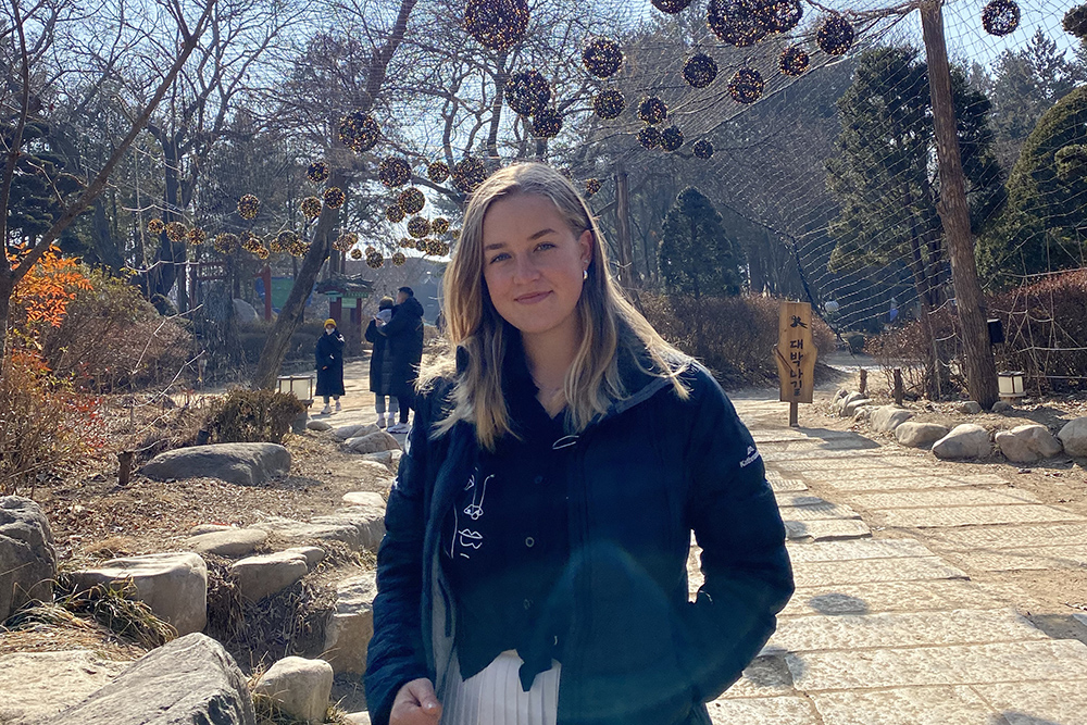 Kate standing in a park