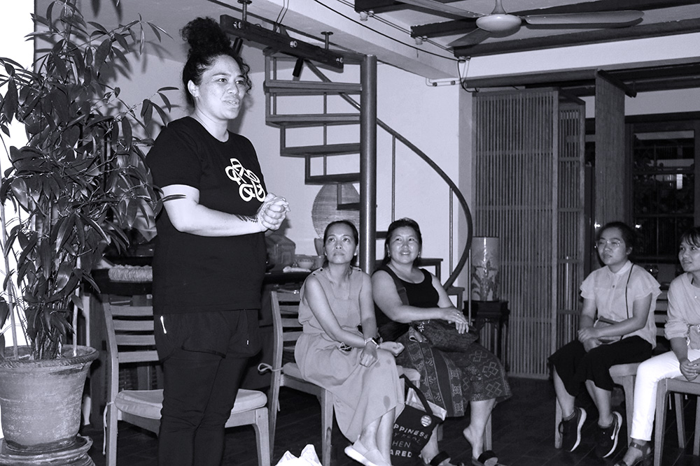 Anne-Maree addressing a group at the opening to the Hoi An Hui