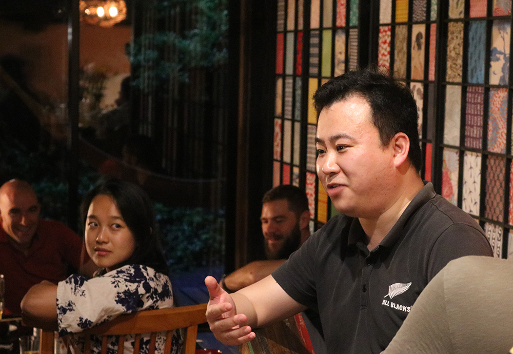 Luke Chin addressing a room