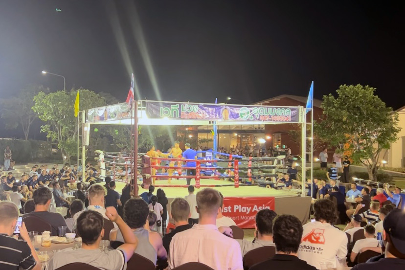 Hamilton Boys rugby team watching an evening Muay Thai bout