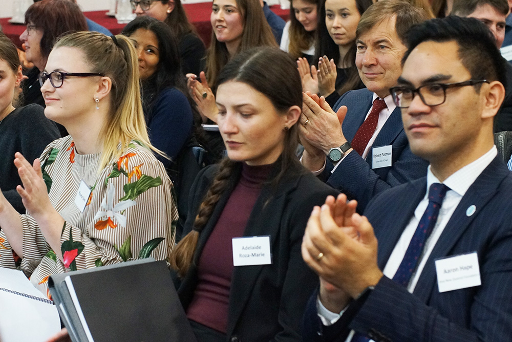 An audience clapping