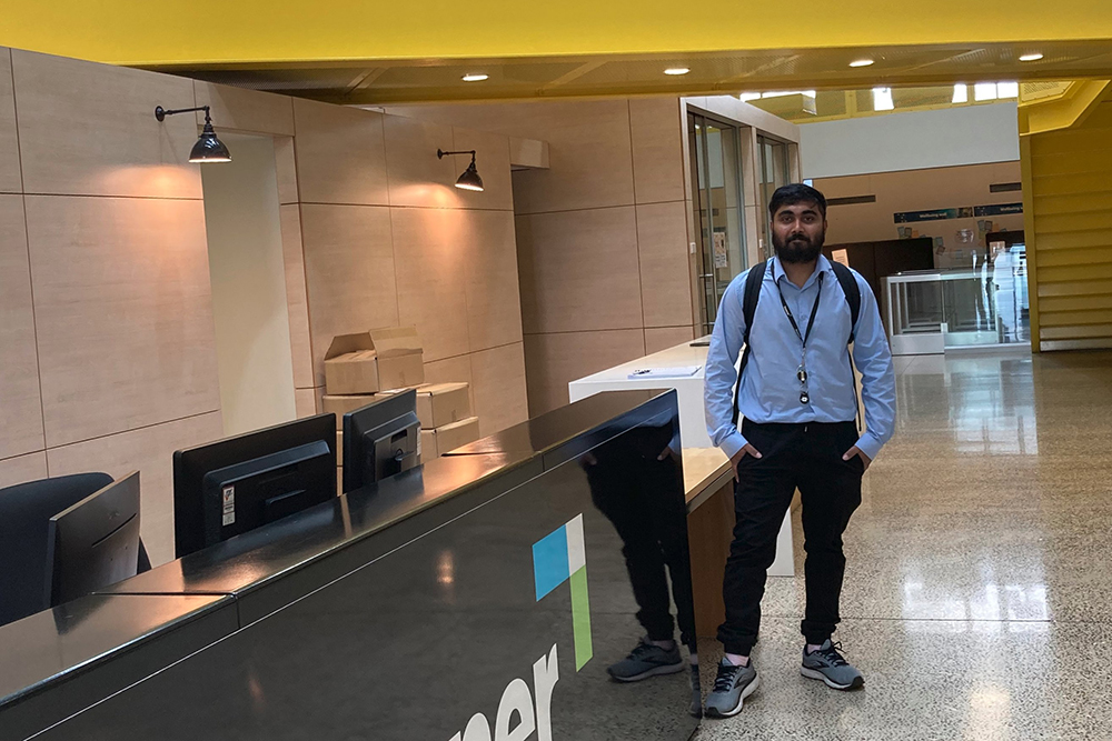 Nikhil in the Downer office foyer