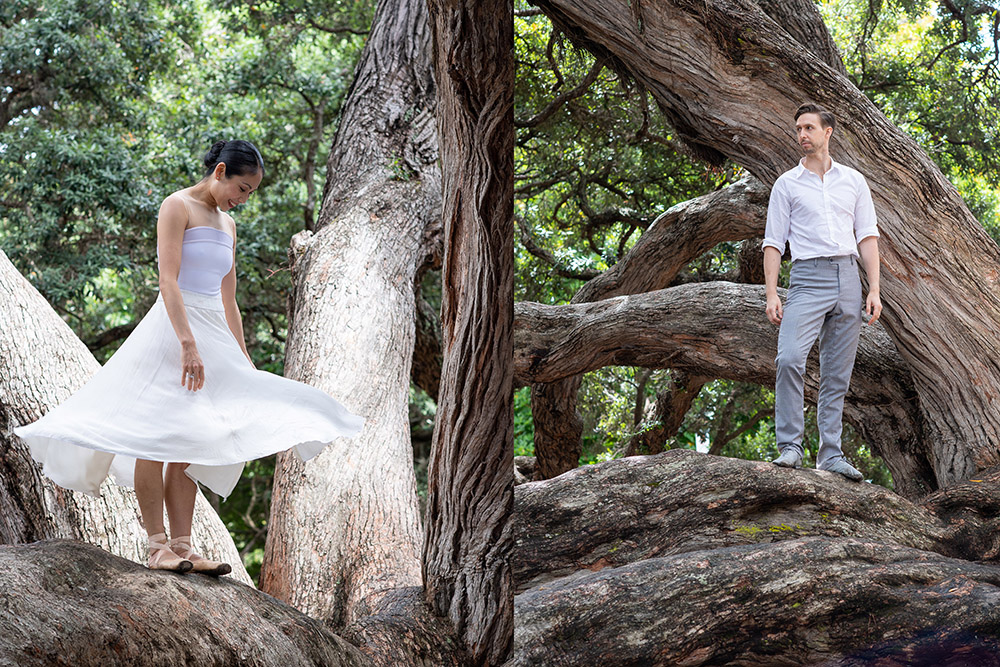Paul and Mayu standing on the limbs of a pohutukawa tree