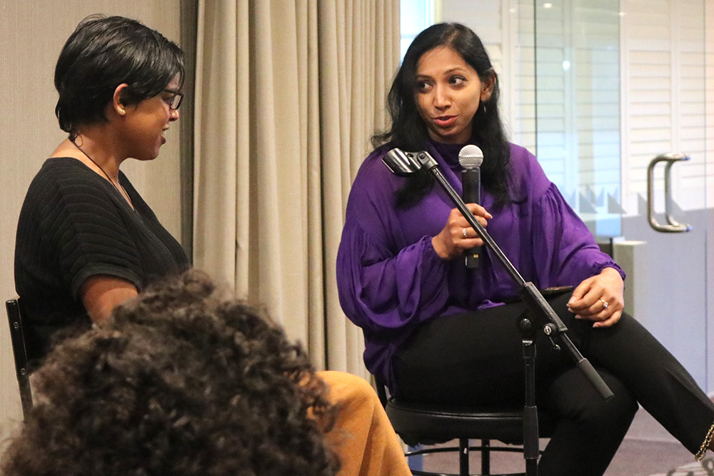 Board member and Leadership Network member Ziena Jalil (right) speaking with MP and former network member  Vanushi Walters